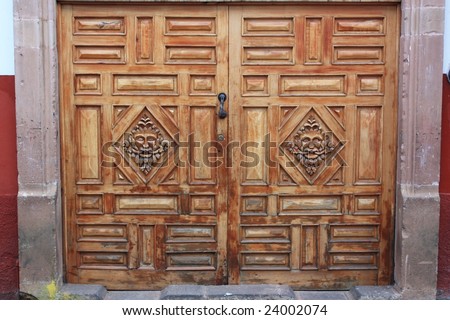 Ancient carved wood & wrought-iron carriage-portal doors; Morelia, Mexico