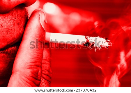 Cigarette in mouth. Bad habit, addiction, problems with health