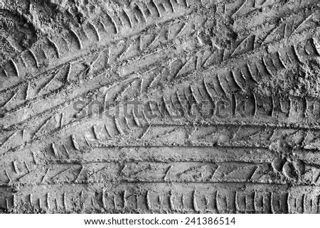 Ribbed tyre traces . Background for articles about traveling, transport and ecology