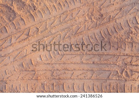 Ribbed tire traces . Background for articles about traveling, transport and ecology