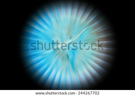 Abstract Background Of Spin Circle Radial Motion Blur in light yellow, blue, green, and black