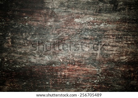 Old Wooden Panel with the Hammered Rusty Nails on the Edge
