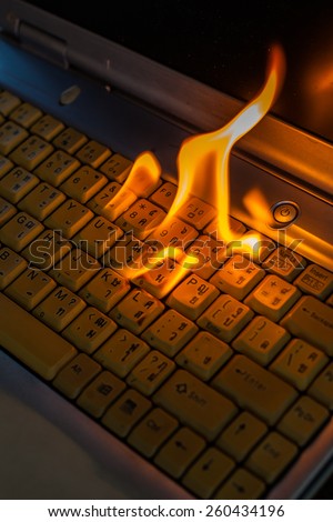 Computer laptop sleeve is on fire. Means love burns up the internet to set the world on fire damaged computers, insurance claims, etc. Hell.