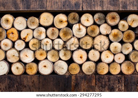 Stacked wood pine timber for construction buildings Background