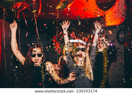 Young woman at club having fun. New year party
