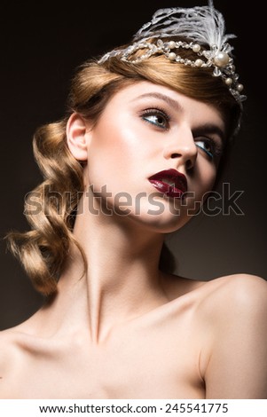 Portrait of elegant retro woman with beautiful hair and dark lips. Beauty face. Picture taken in the studio.