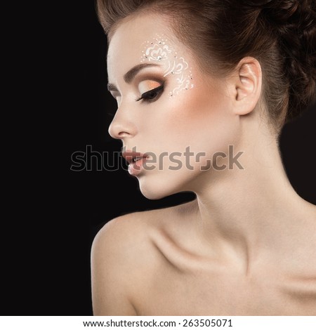 Beautiful girl with perfect skin. Beauty face.Picture taken in the studio on a black background