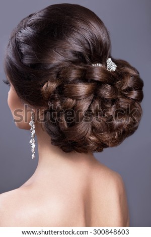 Beautiful  woman in image of the bride. Beauty hair. Hairstyle back view
