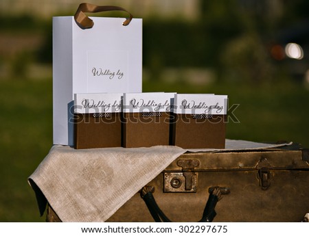 Design of wedding disc. Boxes and packages. Photo taken on the open air. Everything for the wedding.