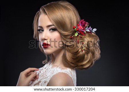beautiful blond girl  in image of the bride with purple flowers on her head. Beauty face.
