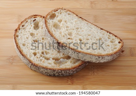 sliced Bread from rye and wheat flour of a rough grinding on cutting board
