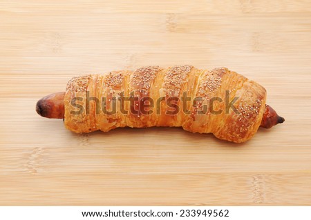 sausage roll bread on cutting board