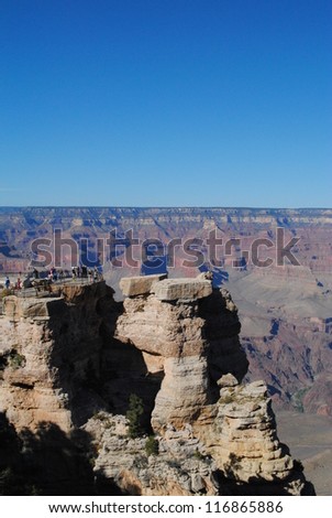 Tourists take in the view at the South Rim of Grand Canyon National Park