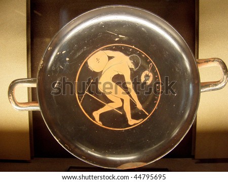 classical greek red figure dish depicting an athlete