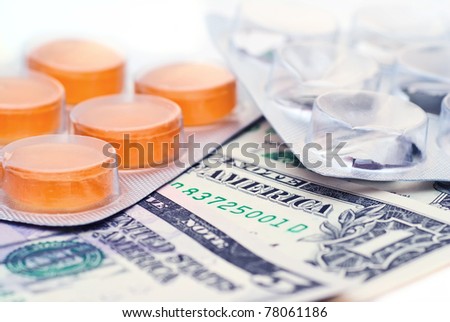 American money and empty and full packing of medicines
