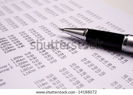 Finances and balances with pen