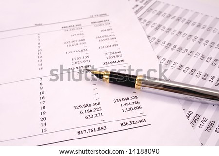 Finances and balances with pen