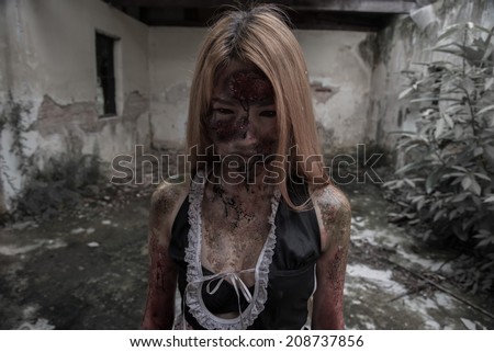 Zombie girl in haunted house scary