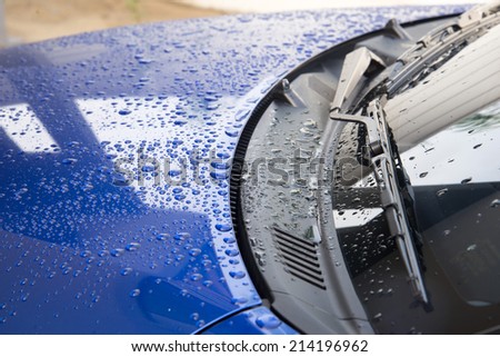 water drops on the blue car