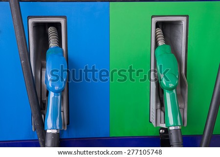 Colorful fuel oil gasoline dispenser at petrol filling station