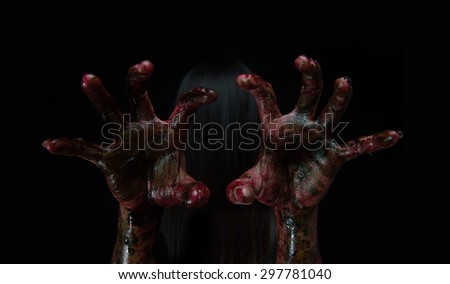 Halloween girl with scary hand