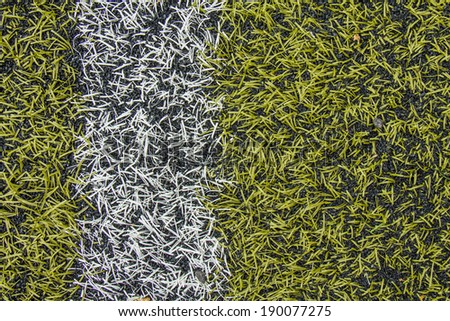 Green artificial turf pattern with a line