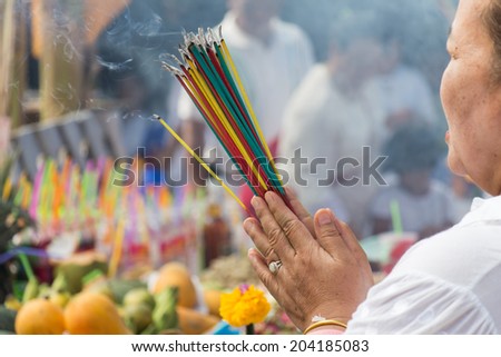 Burning the incense to worship the sacred