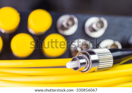 Fiber optic single mode FC jack and connector background.