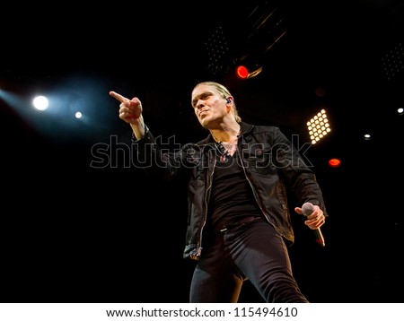 NAMPA, IDAHO - SEPTEMBER 25: Brent smith from shinedown points to the crowd at the Rockstar Uproar Festival on September 25 2012 in Nampa, Idaho