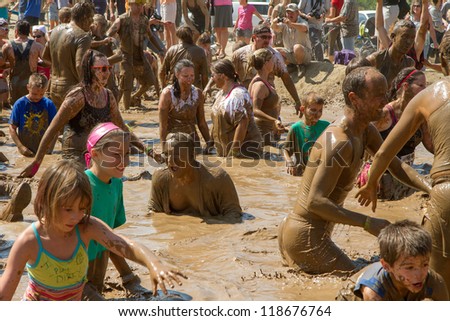 BOISE, IDAHO - AUGUST 25: Crowd gathered in the mud pit at the Dirty Dash August 25 2012 in Boise, Idaho