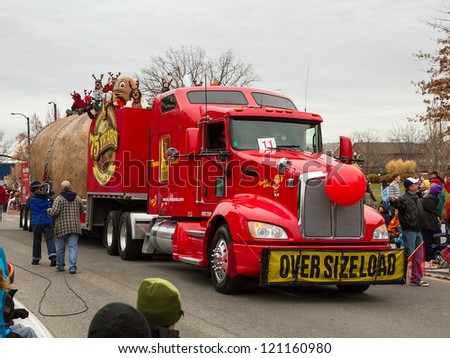 BOISE, IDAHO - NOVEMBER 24: The Famous Idaho Potato Truck moves through the Boise Holiday Parade in Boise, Idaho November 24 2012