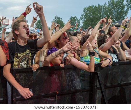 NAMPA/IDAHO - JULY 2: The crowd goes crazy while Five Finger Death Punch is on the stage at the Rockstar Mayhem Festival in Nampa, Idaho July 2nd, 2013