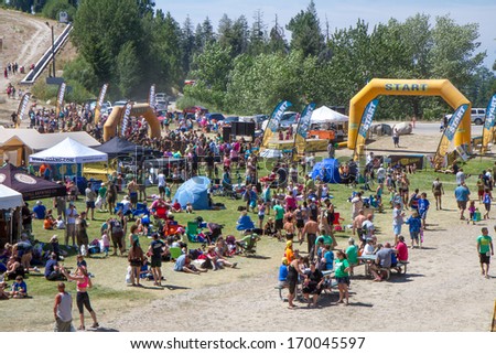 BOISE, IDAHO/USA - AUGUST 10, 2013:  Crowd of people having fun with the after race party at the The Dirty Dash