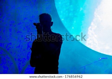 BOISE, IDAHO/USA - FEBRUARY 8, 2013: Silhouette  of Dan reynolds on stage during his performance with Imagine Dragons during the Night visions tour