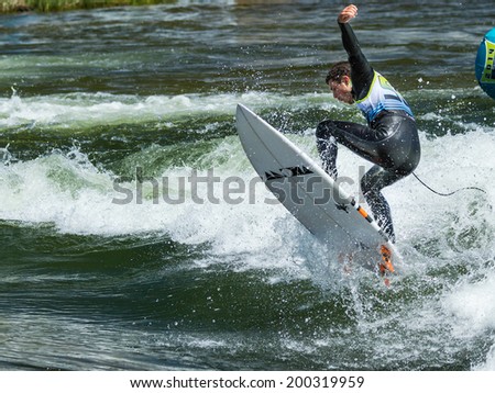 CASCADE, IDAHO/USA - JUNE 21, 2014: Up in the air one of the contest goes during the Payette River Games