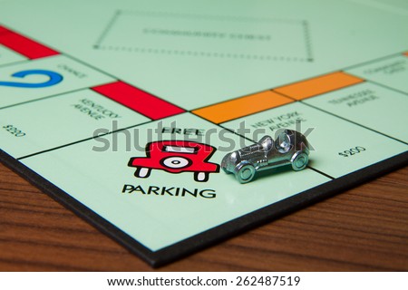 CALDWELL, IDAHO/USA - MARCH 16, 2015: Car pulling into the Free Parking spot in Monopoly