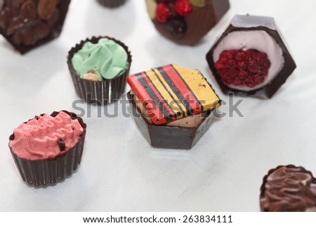 still life chocolates on a smooth surface