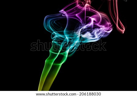 Colored smoke art abstract background isolated on black