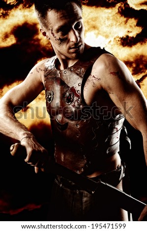 Ancient Rome warrior with sword on the fire background