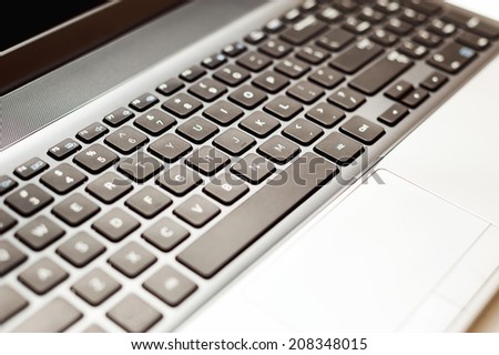 Computer keyboard close-up with copy space. selective focus