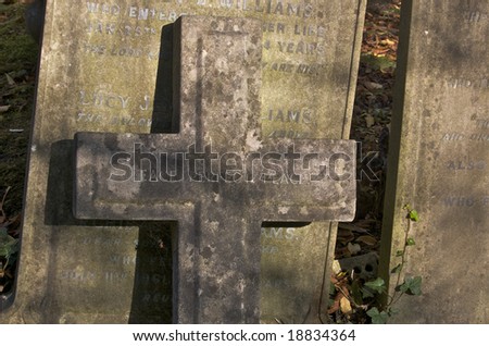 beautiful old cross in a cemetery
