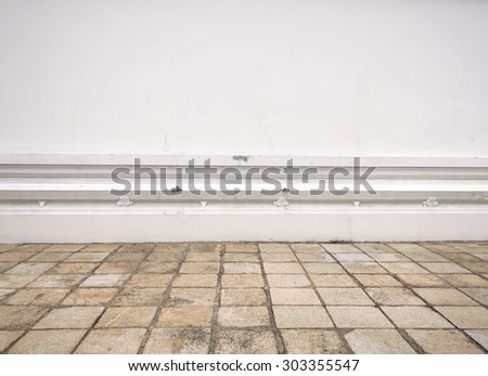 Vintage interior of stone wall and gray cement floor