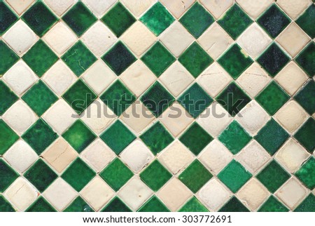 Green and white wall tiles as a background image
