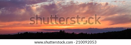 Panoramic photo of vibrant sunset