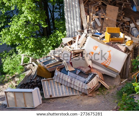 Funny broken furnitures trash pile