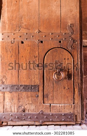 Old worn strong wooden door