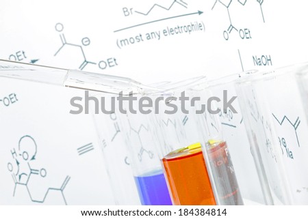 liquid drop into test tube for testing in chemical laboratory