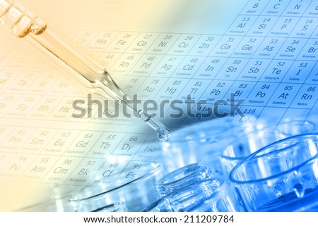 Liquid drop into test tube for testing in chemical laboratory.