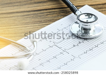 Stethoscope and medical check-up report for healthcare concept