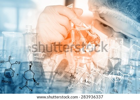 A researcher is doing his chemical lab research at laboratory.